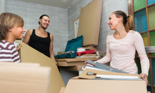Man with van loading furniture for a local West Green move