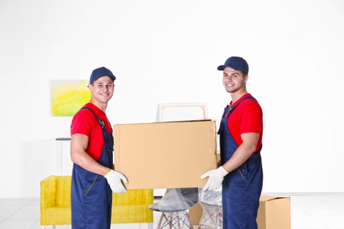 House movers helping a West Green home relocation with boxes and furniture