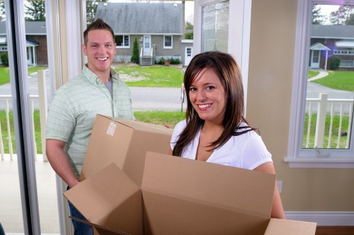 Packed household belongings ready for transport in West Green