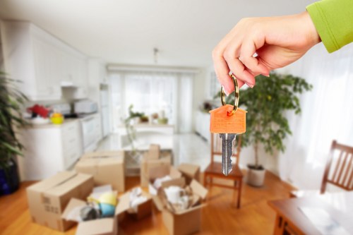 Movers handling office and retail equipment in a local commercial move