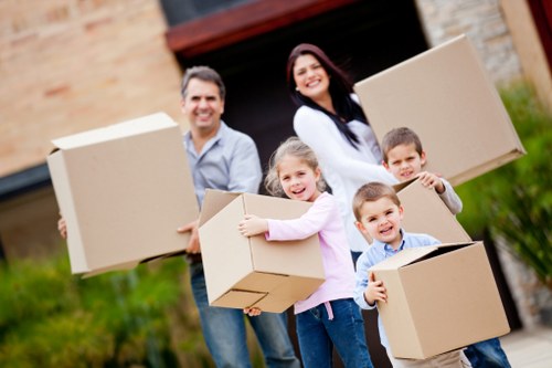 Furniture and household items being loaded into a moving truck
