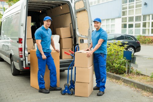 Commercial moving team assisting a business move near West Green