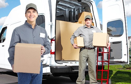 Packed crates and labelled business items ready for relocation