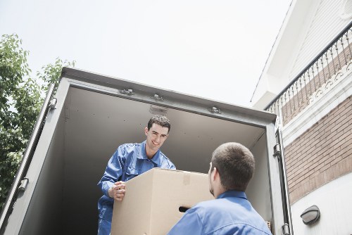 Man with van in West Green securing items for transport