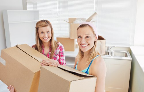 West Green residential and commercial moving service with packed boxes